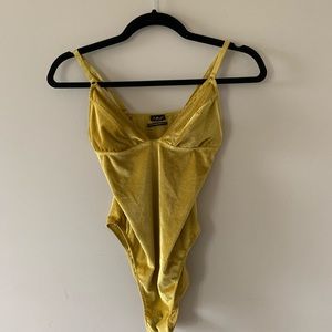 Yellow velvet out from under bodysuit